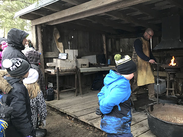 blacksmith demonstrating in shed