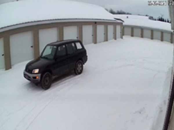 black suv at storage lockers