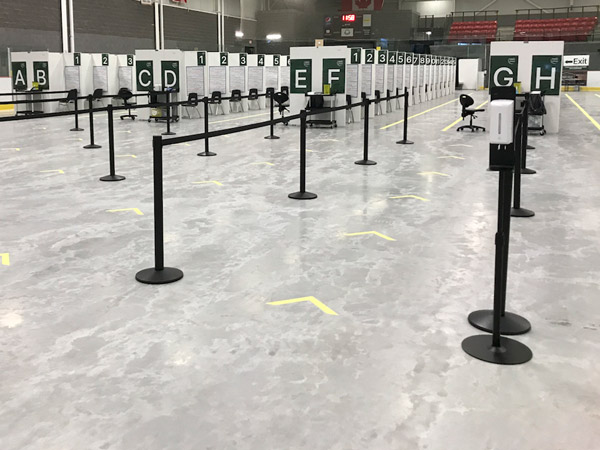 hockey hub arena set up for vaccinations.