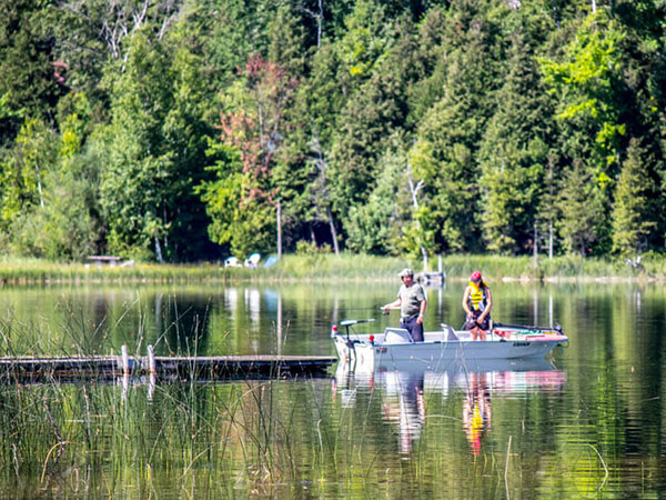 Two people fishing on Wilder Lake