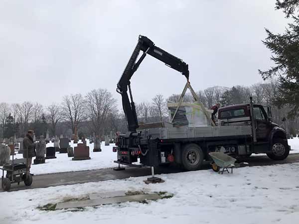 The Potter's Field monument was off-loaded and put into place on a cold winter day