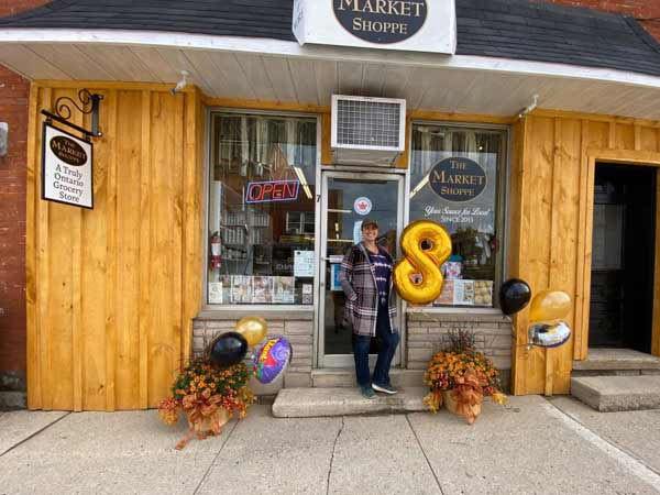Tracy Nietvelt-Prentice in front of The Market Shoppe