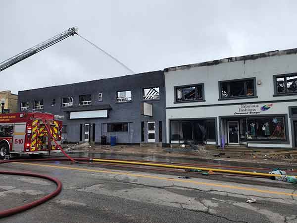 Hotel and Fabulous Fashions showing fire destruction.