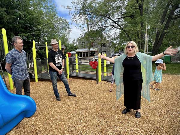 Pastor Christine Smaller blessing the playground