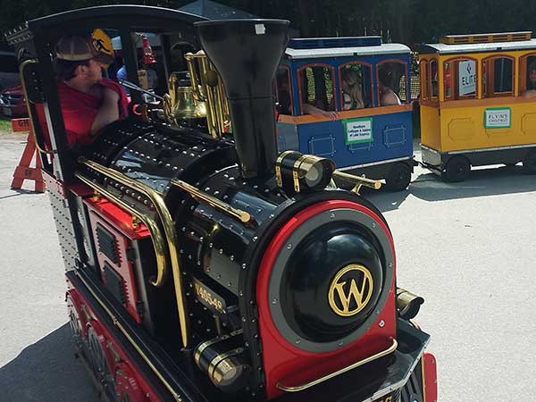 Trackless train boarding passengers at Gold Rush