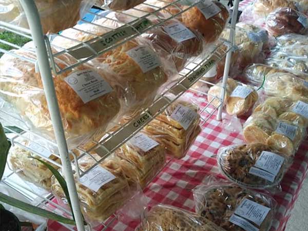 a selection of breads, waffles and baked goods