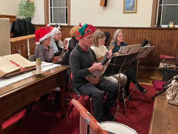 ukulele players at Cookies and Carols event