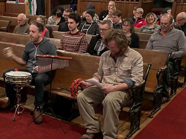 audience at Cookies and Carols event