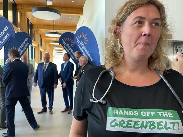 Dr. Erica Ferguson protests at the Markdale Hospital grand opening