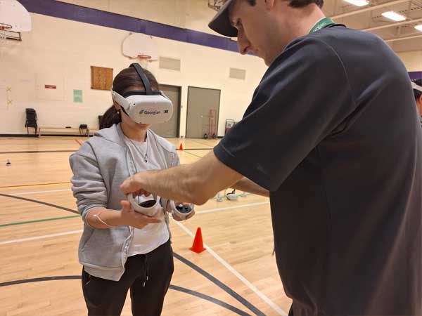 students trying out Auto-XR headset