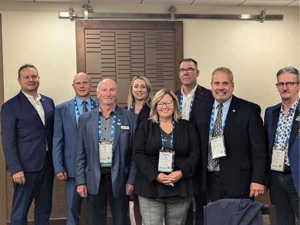 Minister Thompson with WOWC caucus