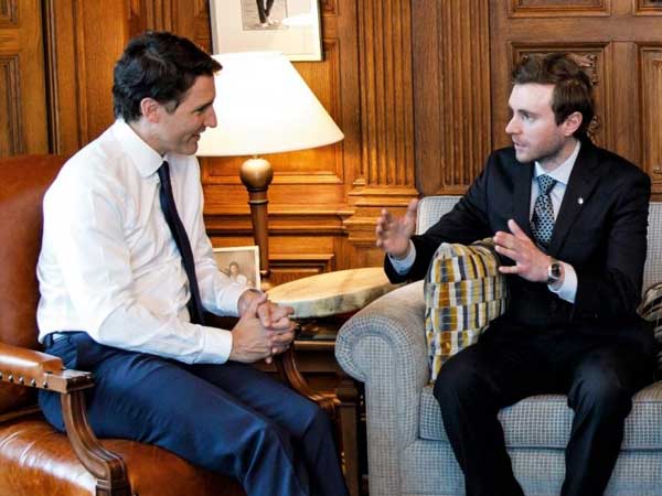 Justin Trudeau talking with Adam Shoalts