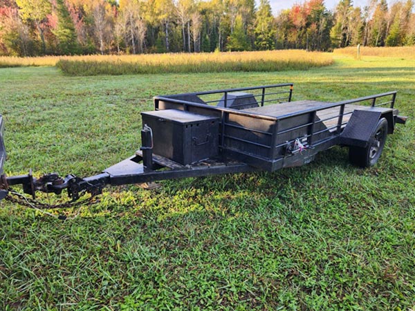Stolen black utility trailer.