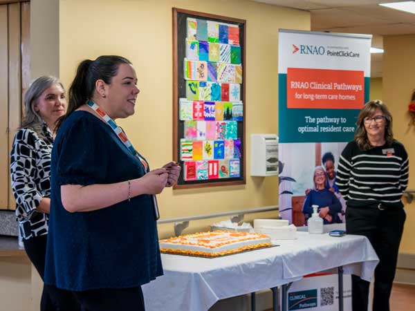 Registered Nurses with cake.