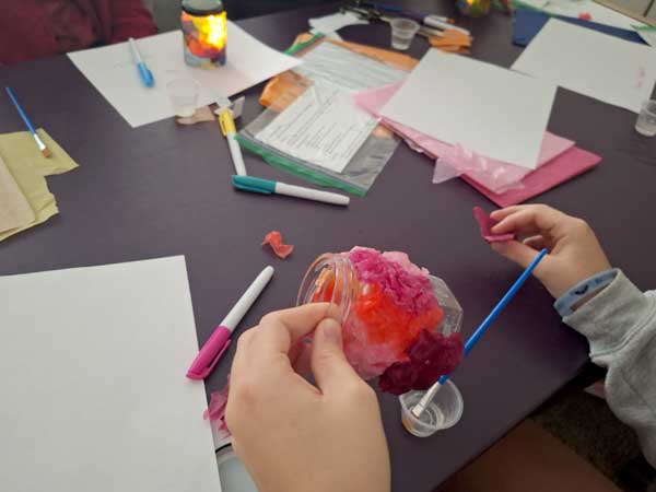 student candle making during art workshop